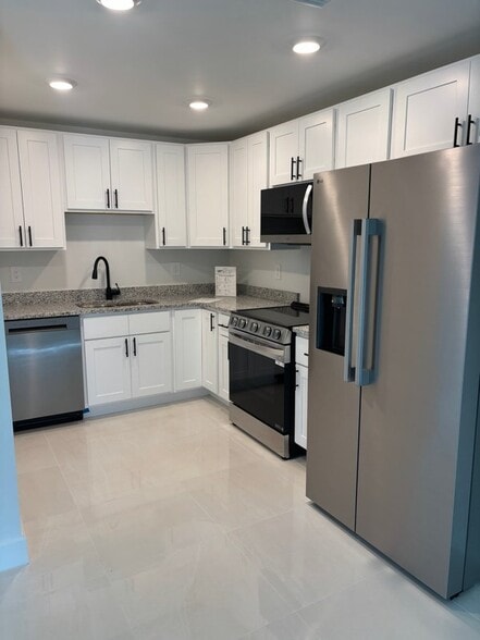 Building Photo - 2409-2411 Churchill Ave N