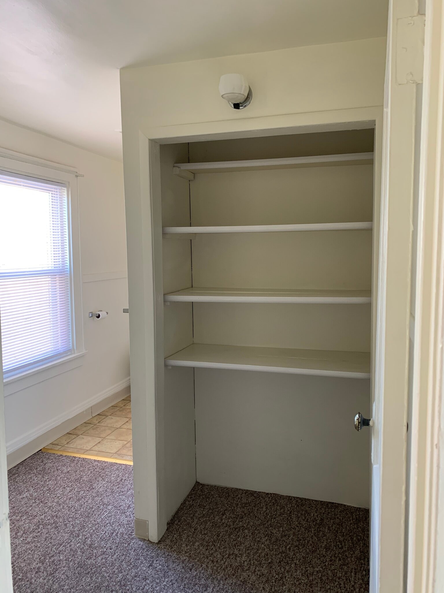 Linen closet in bathroom. - 933 Highland Ave