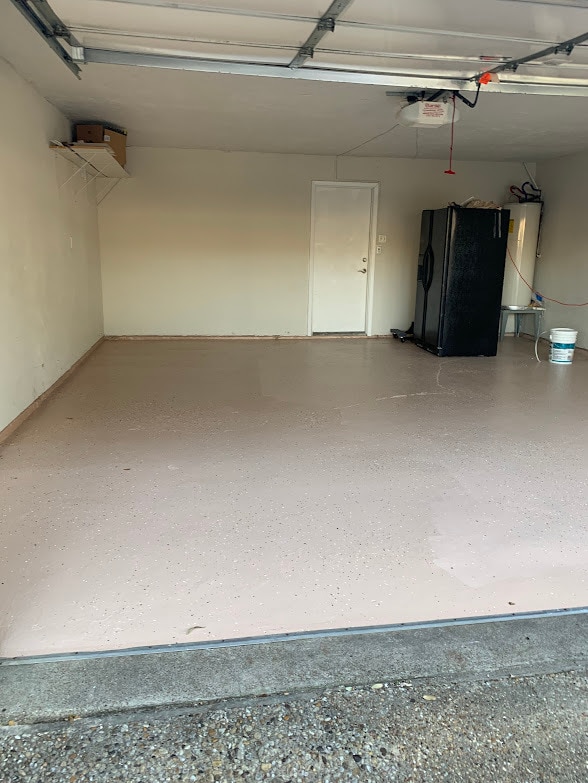 Two car attached painted garage with extra large refrigerator - 3136 Pin Oak Ct