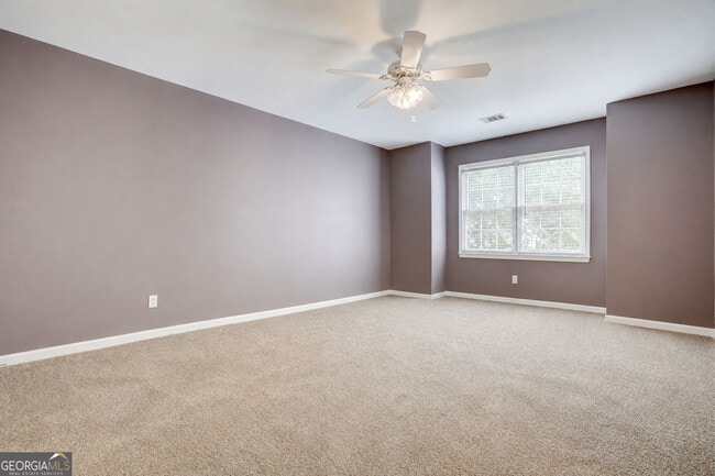 Building Photo - 9485 Nesbit Lakes Dr