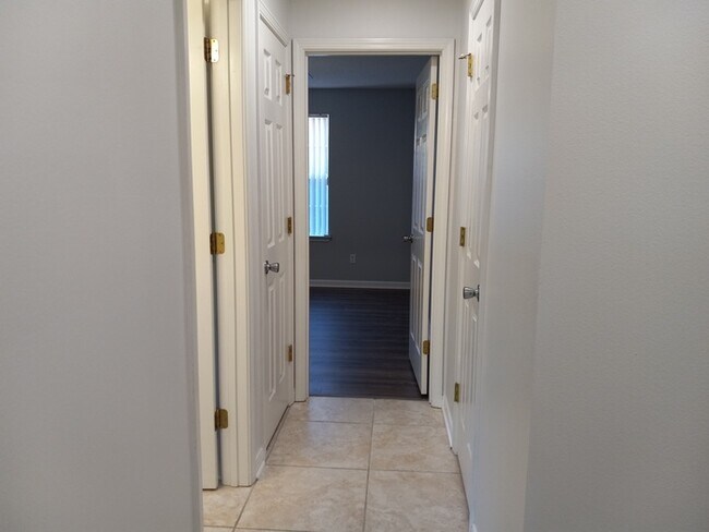 Building Photo - Large 3/2 Family Home that is Conveniently located off Blue Angel PKWY