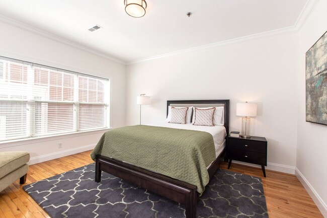Building Photo - Luxurious Furnished Downtown Condo - 6-18 ...