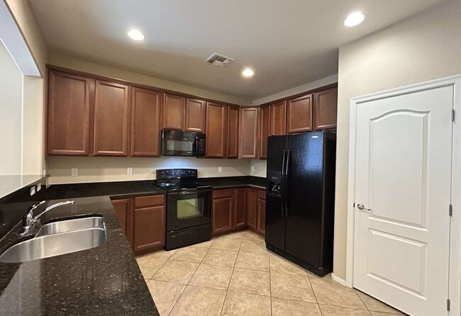 Building Photo - 6558 W Montebello Ave