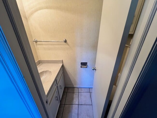 Building Photo - Step into this inviting, sunlit home where space and comfort blend seamlessly