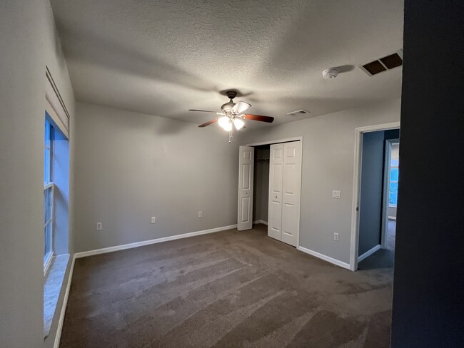 Upstairs Front bedroom with Closet - 13155 Liberty Square Dr