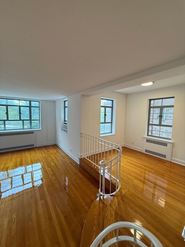Building Photo - The Leslie — A Private Garden Enclave for ...
