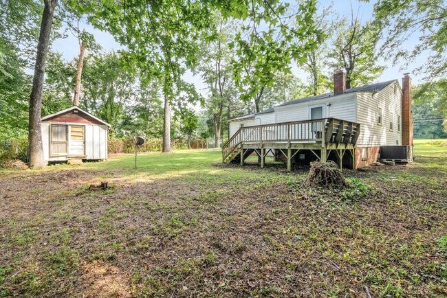Building Photo - Adorable Home, Just Painted, Wood Flooring...