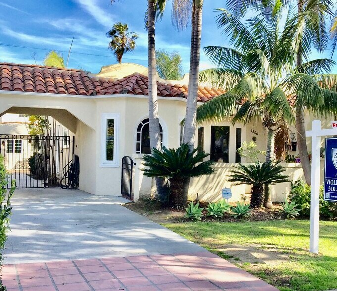 Front entry through iron gate - 1348 S Curson Ave