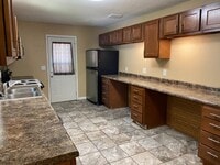 Building Photo - Check Out This Huge 4-Bedroom House!