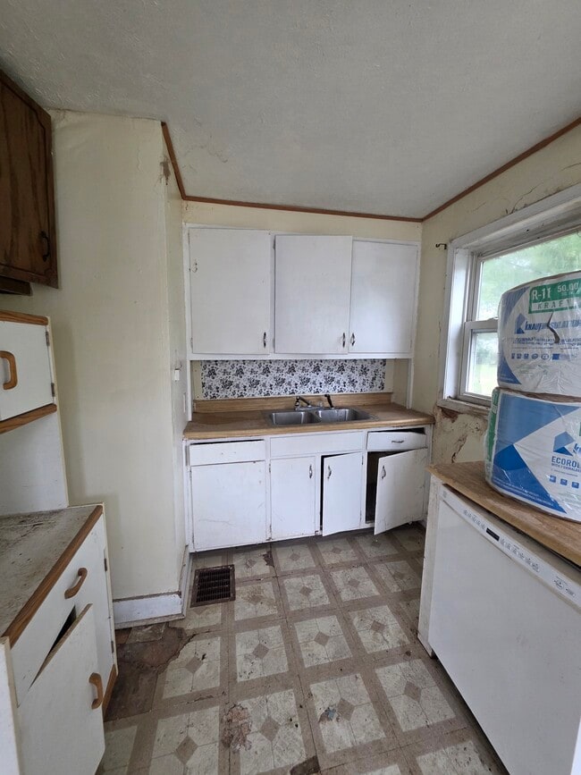 Building Photo - Own your own home for less than rent