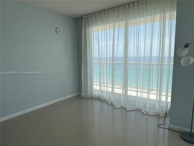 Building Photo - 16699 Collins Ave