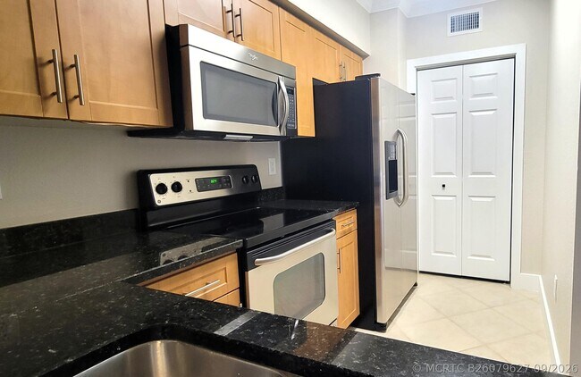 Building Photo - 6418 Emerald Dunes Dr
