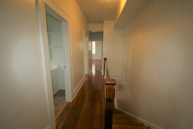 Building Photo - 1,550 square feet in Trinity Park. High ceilings, French doors, and a porch worth sitting on.