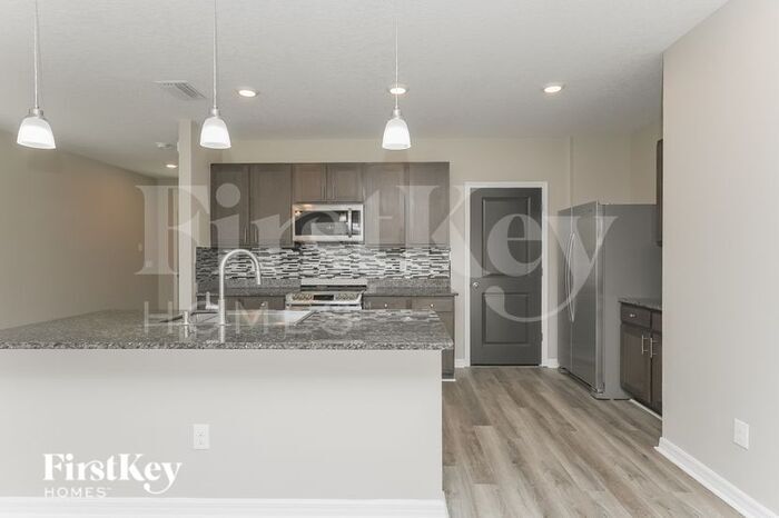 Building Photo - 7944 Pelican Reed Cir