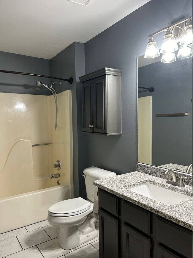 Building Photo - 4 Bedrooms with Finished Basement and Bonu...
