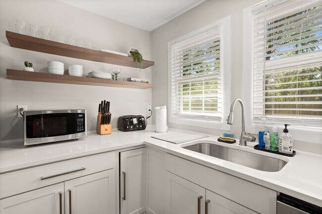 Building Photo - Classic Brick Ranch with Modern Updates and Expansive Backyard