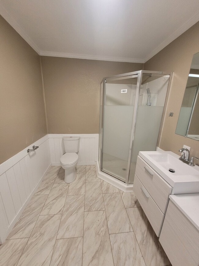 Building Photo - 3 bed 2 bath home with a carport in backyard
