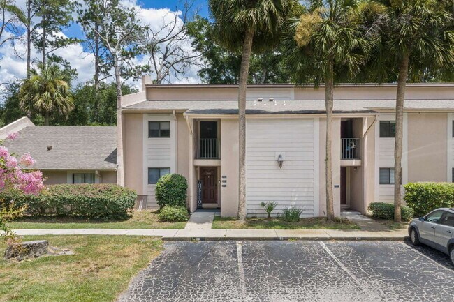 Building Photo - Freshly Updated 2BR Condo with Private Balcony, Community Pool, & In-Unit Laundry
