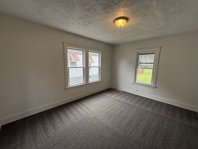 Building Photo - Three bedroom one bathroom 2 story home for rent