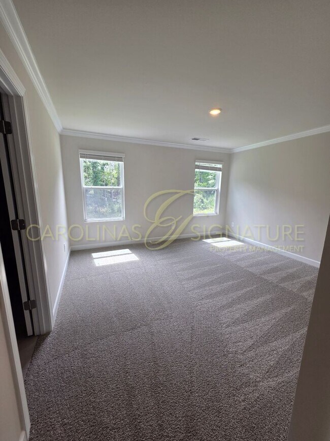 Building Photo - AVAILABLE SEPTEMBER 1! NEW CONSTRUCTION; 3...