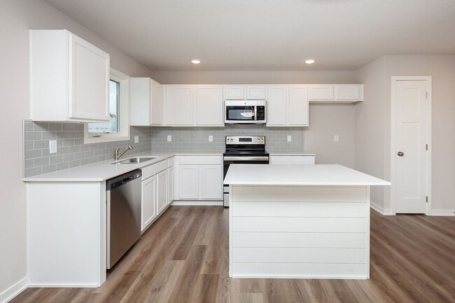 Building Photo - Prime Living: A Spacious Haven with Fenced Backyard in Ankeny