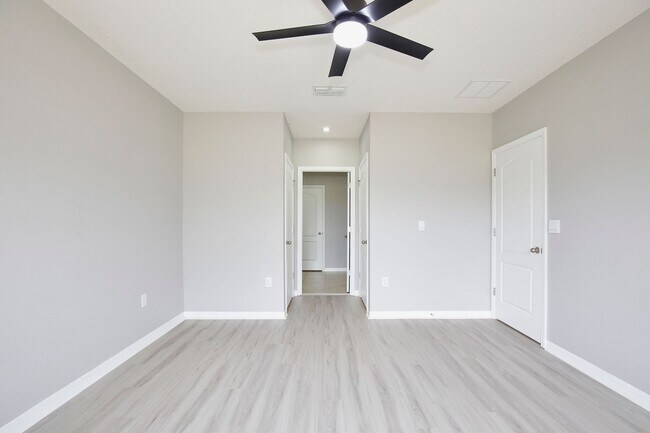 Building Photo - Move-In Ready 2BR/2BA Villa with Den + 2-Car Garage | Lake Nona Adjacent | Suncrest at St. Cloud