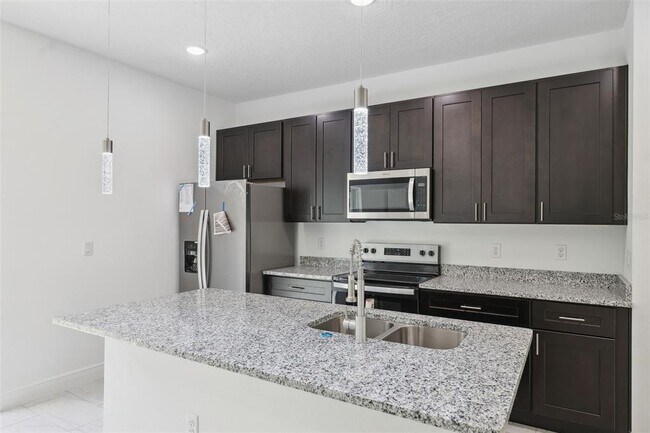 Building Photo - 10089 N Athenia Dr