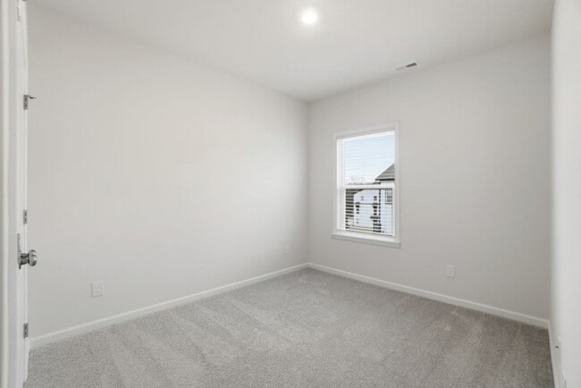 Building Photo - Brand-new three-story townhome in the University area at Senata at Research Park!