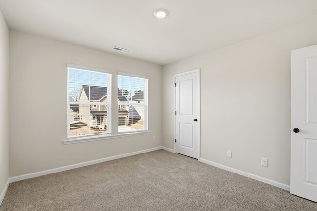 Building Photo - Brand New 4BR Home in The Pines at Paw Creek – Modern Design