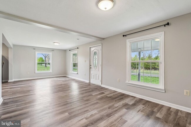 Building Photo - Experience the perfect blend of peaceful country charm and modern comfort in this beautifully ref...