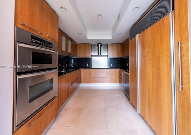 Building Photo - 9401 Collins Ave