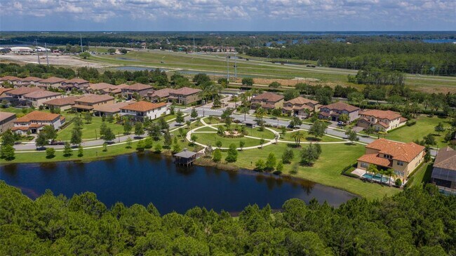 Building Photo - Gorgeous 3/2 Mediterranean Villa with Waterfront Screened Patio and 2-Car Garage in the Prestigio...