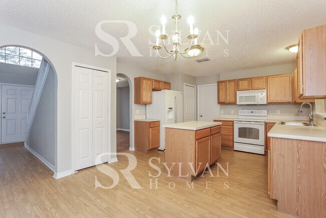 Building Photo - Your Dream Awaits: A Haven of Style and Se...