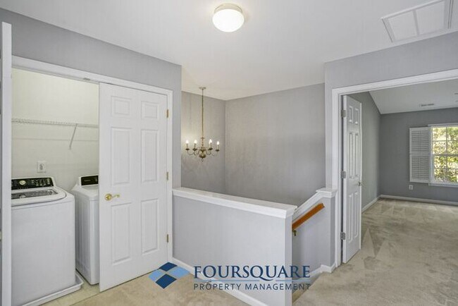Building Photo - Lakefront Townhome with 1st Floor Bedroom, Fireplace & 2-Car Garage – In Raleigh