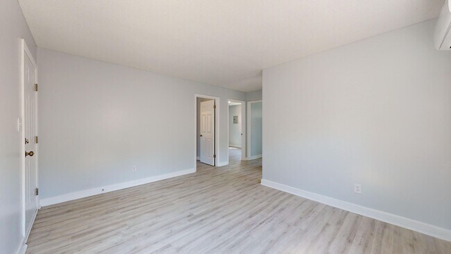 Building Photo - Two bedroom apartment for $1199 per month ~5 minutes from the Airport in a quaint and quiet commu...