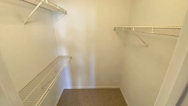 Building Photo - MOVE IN SPECIAL! First Floor 2BR/2BA Condo...