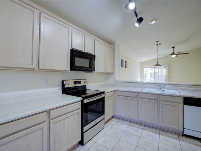 Building Photo - Spacious Living in a Gated Community with Resort-Style Amenities!