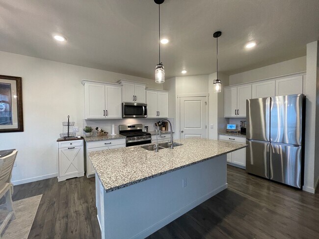 Building Photo - Live Lavishly in Harmony Ridge- Fully Furnished 5-Bedroom Dream Home with Backyard Oasis & Speake...