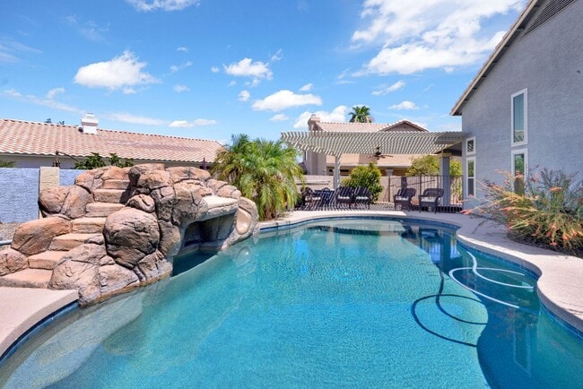 Building Photo - Beautiful 5-Bedroom Home with Private Pool...