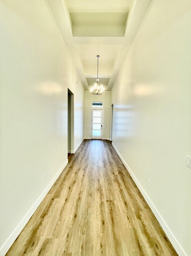 Building Photo - BRAND NEW Three Bedroom Home in Desert Cliffs