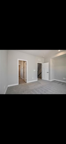 Primary Bed w/ Bath & Walk-in Closet - 458 W Tremont Ave