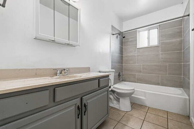 Building Photo - Charming 4-Bedroom with 2 Baths and Finished Basement!