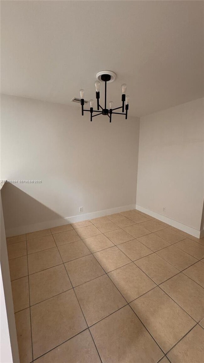 Building Photo - 3801 Cocoplum Cir