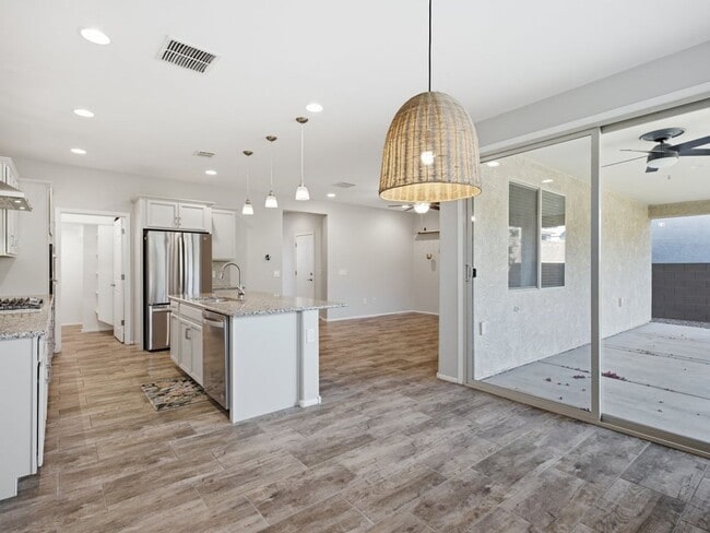 Building Photo - Spacious Two-Story Home with Open Living & Community Pool Access
