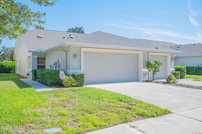 Building Photo - 1412 Coconut Palm Cir