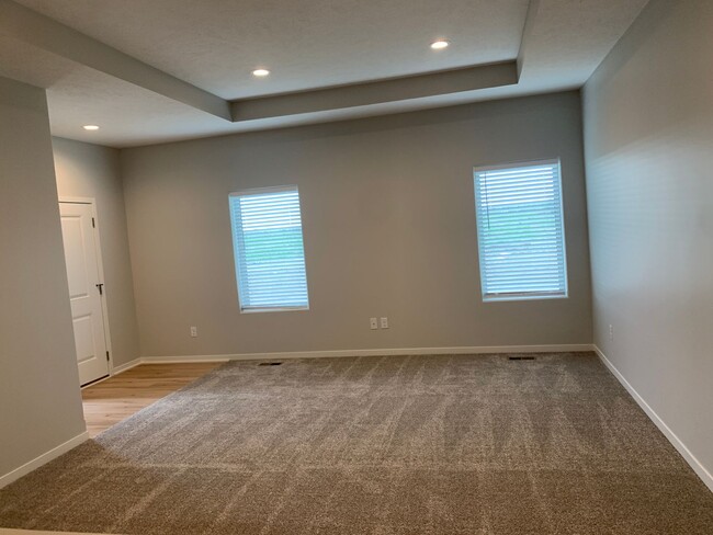 Building Photo - Zero entry ranch townhome with 2 stall gar...