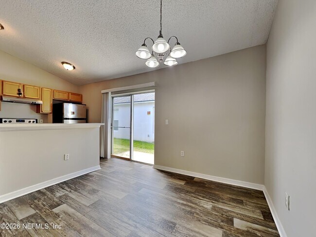 Building Photo - 6637 Gentle Oaks Dr E
