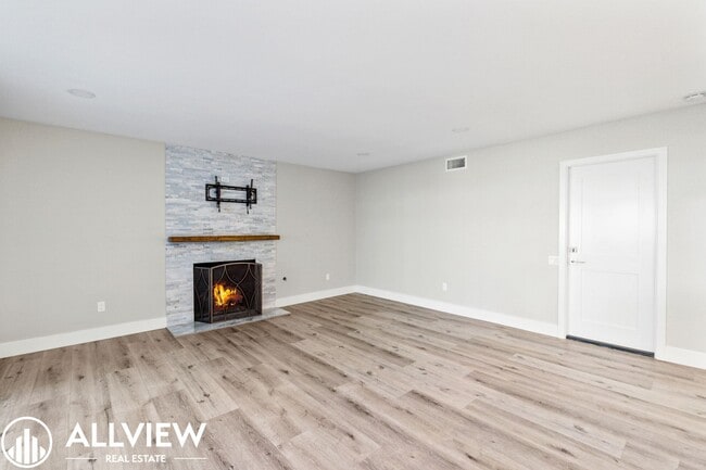 Building Photo - Welcome to this stunning 5-bedroom, 4-bath...