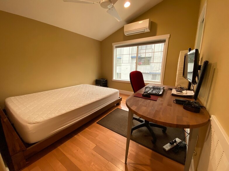 Second bedroom with attached full bath and walk-in closet - 1138 15th Ave