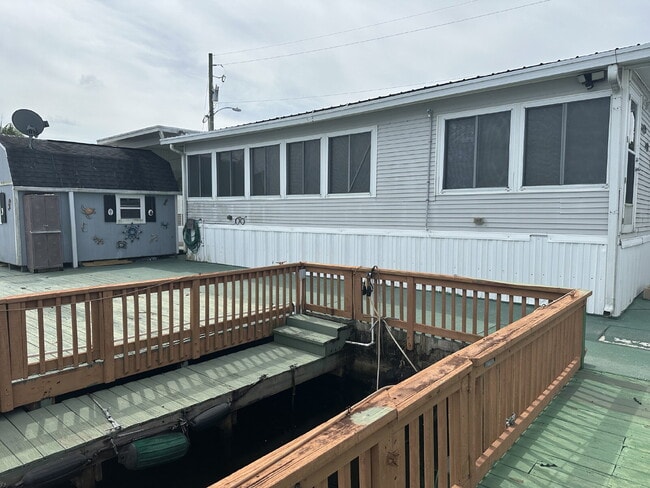 Building Photo - Cozy and Convenient Water Front 2/1 in St. Cloud's Shelter Cove